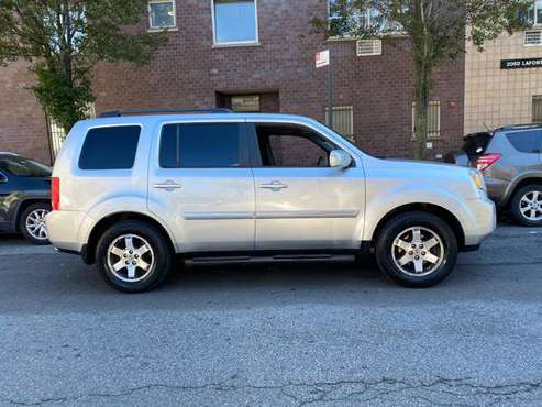 2010 HONDA PILOT TOURING SPORT UTILITY 4D - cars & trucks - by owner... for sale in Bronx, NY
