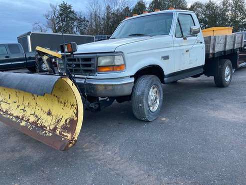 Ford F350 4x4 flat bed with plow - cars & trucks - by owner -... for sale in Ellington, CT