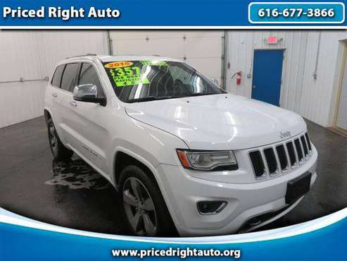 2015 Jeep Grand Cherokee 4WD 4dr Overland - LOTS OF SUVS AND TRUCKS!! for sale in Marne, MI
