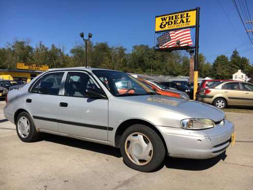 2002 Chevrolet Prism,91k, HOOPTY!! Comes with dent! for sale in Cincinnati, OH