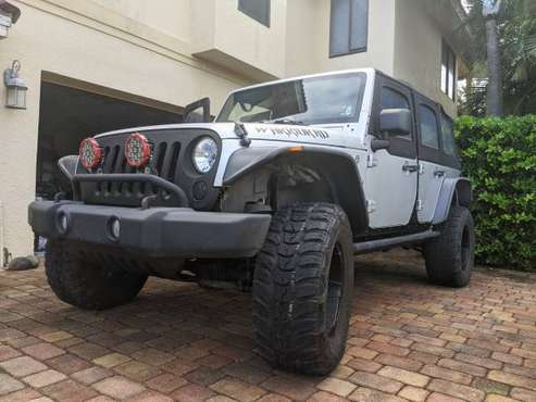 2012 Jeep Wrangler Unlimited Sport - cars & trucks - by owner -... for sale in Satellite Beach, FL