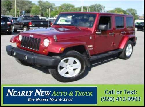 2012 Jeep Wrangler Unlimited Sahara Maroon Convertible - cars & for sale in Green Bay, WI