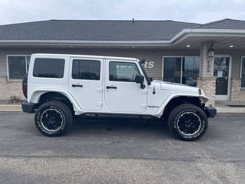 2012 Jeep Wrangler Unlimited Sahara - - by dealer for sale in Owatonna, MN