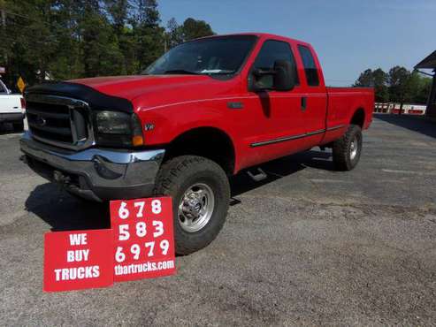1999 FORD F250 4X4 EXTENDED CAB FOUR WHEEL DRIVE w/7 3 and lift for sale in Locust Grove, GA