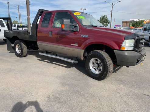 2004 FORD F250 LARIAT POWER STOKE DIESEL FLAT BED 4X4 /MUST SEE .. for sale in Wheat Ridge, CO