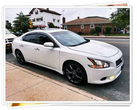 Nissan Great sedan white SV - 15OO for sale in Gaithersburg, District Of Columbia