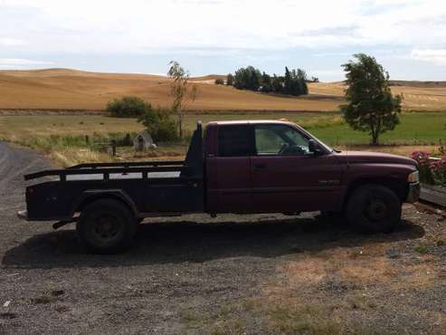 2002 Dodge 3500 SLT Extended Cab dually with flatbed for sale in Pullman, WA