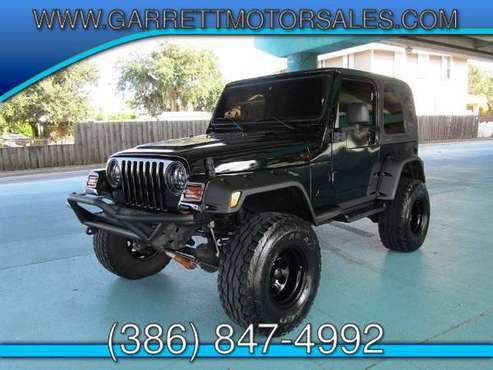 2002 Jeep Wrangler X low miles rebuit title for sale in New Smyrna Beach, FL