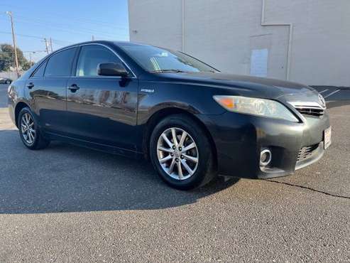 2010 Toyota Camry Hybrid runs prefect smog clean title - cars & for sale in Modesto, CA