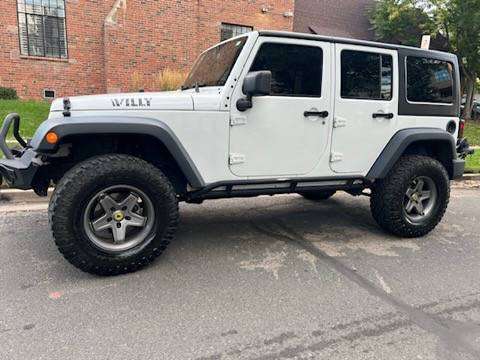 2015 Jeep wrangler Unlimited Willys Wheeler Sport Utility 4D - cars for sale in Boulder, CO