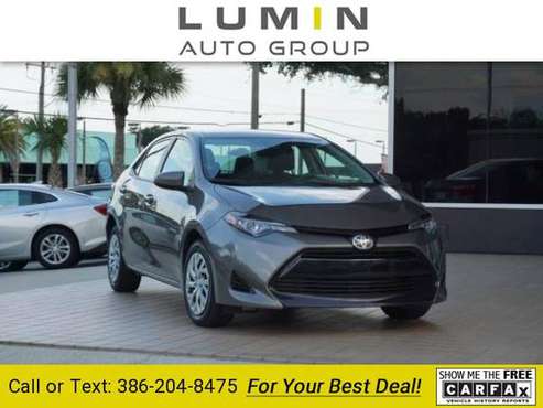 2017 Toyota Corolla LE sedan Falcon Gray Metallic for sale in New Smyrna Beach, FL