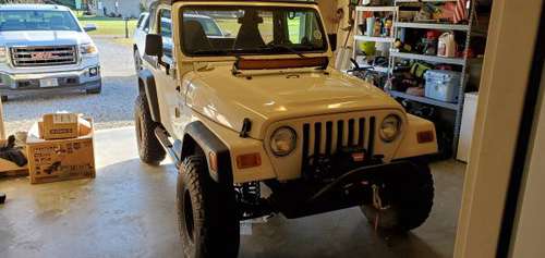 2002 Jeep Wrangler 6 cyl. 5 speed - cars & trucks - by owner -... for sale in Tupelo, MS