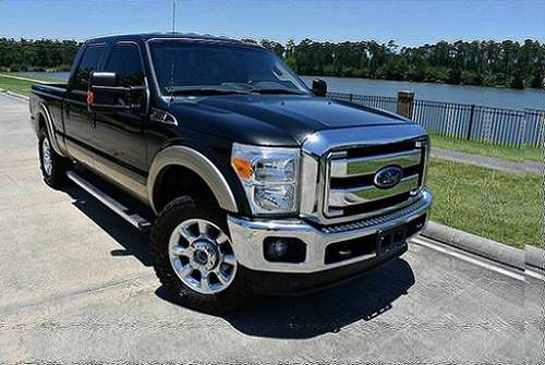 Loaded Ford F-250 Lariat leather diesel 4x4 crew 305/45/22 - cars & for sale in Denver , CO