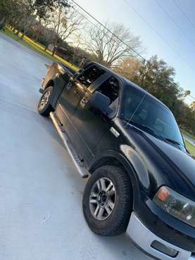 Black 2005 f-150 with brand new tires and a tocuhscreen, runs great for sale in Harlingen, TX