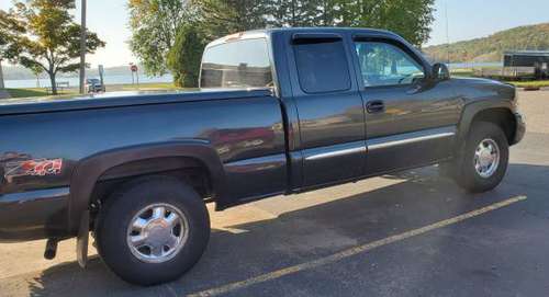 GMC 2003 4x4 Sierra Runs great new tires - cars & trucks - by owner... for sale in National Mine, MI
