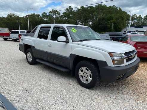 03 Chevy Avalanche 1500 4x4 - Financing Available - cars & trucks -... for sale in St. Augustine, FL