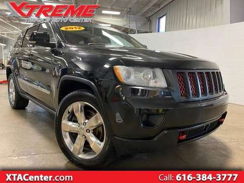 2012 Jeep Grand Cherokee 4dr Overland 4WD - - by for sale in Coopersville, MI