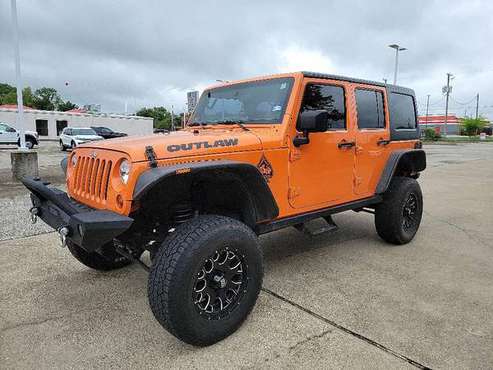 2012 Jeep Wrangler Unlimited Sport - - by dealer for sale in Gilmer, TX