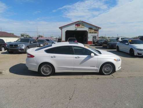 2014 Ford Fusion 4dr Sdn Titanium Hybrid FWD 116, 000 miles 10, 500 for sale in Waterloo, IA