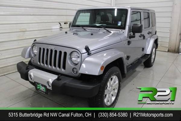 2015 Jeep Wrangler Unlimited Sahara 4WD Your TRUCK Headquarters! We for sale in Canal Fulton, OH – photo 2