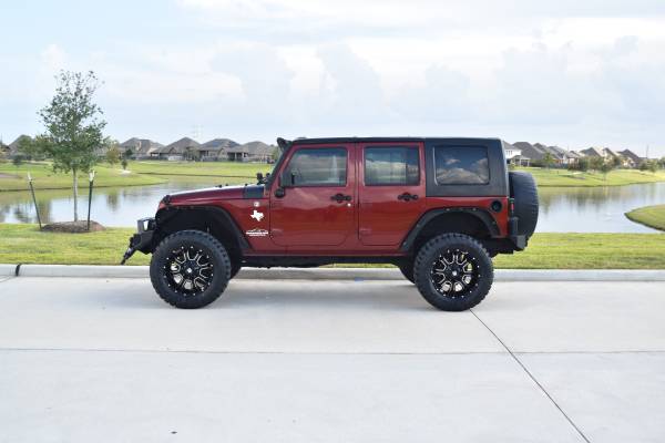Lifted 2009 Jeep Wrangler Unlimited for sale in Rosharon, TX
