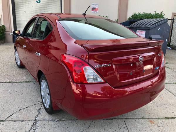 2014 Nissan Versa SV 75k miles Clean title Paid off red/blk for sale in Baldwin, NY – photo 4