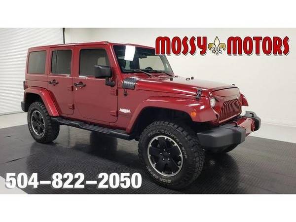 2012 Jeep WRANGLER UNLIMITED SUV SAHARA - Deep Cherry Red Crystal... for sale in New Orleans, LA