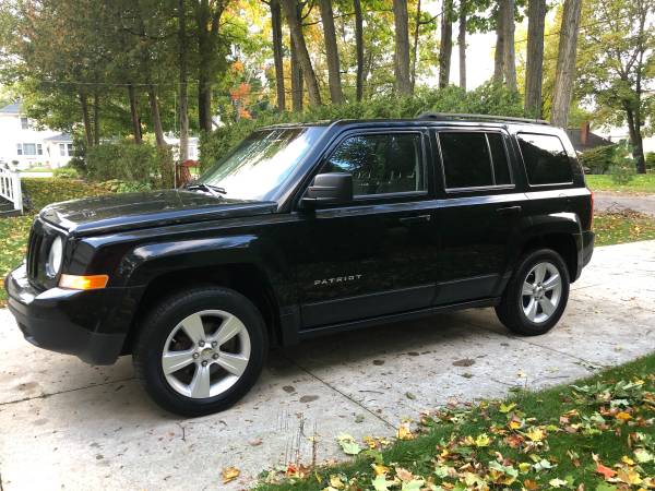 2012 Jeep Patriot 4x4 Moonroof Lower Miles Newer tires for sale in Charlevoix, MI