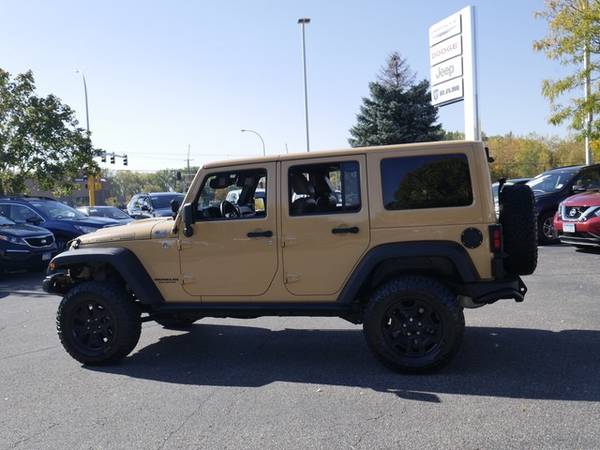 2013 Jeep Wrangler Unlimited Sahara for sale in Brooklyn Park, MN – photo 8