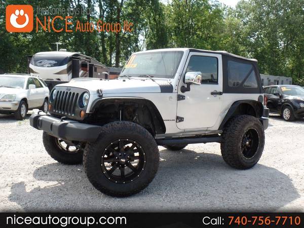 2011 Jeep Wrangler 4WD 2dr Sahara - - by dealer for sale in Carroll, OH