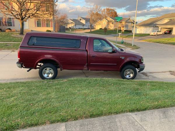 1999 Ford F150 4WD - cars & trucks - by owner - vehicle automotive... for sale in Cedar Rapids, IA