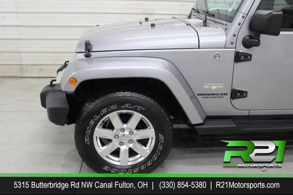 2015 Jeep Wrangler Unlimited Sahara 4WD Your TRUCK Headquarters! We for sale in Canal Fulton, OH – photo 4