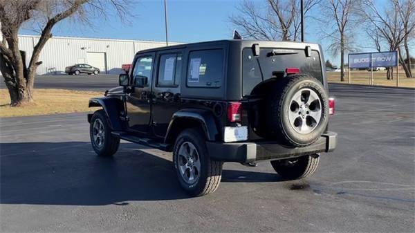 2017 Jeep Wrangler Unlimited Sahara suv Black Clearcoat - cars & for sale in Augusta, KS – photo 9