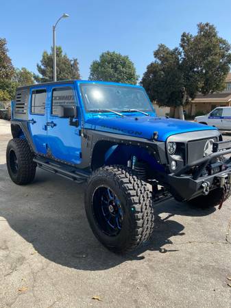 2016 Jeep Wrangler JK only 14k miles - cars & trucks - by owner -... for sale in Rialto, CA