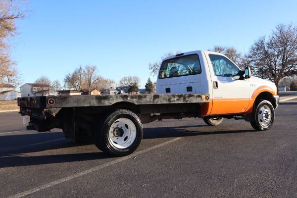 1999 Ford F-550 Super Duty Diesel 4x4 4WD Flatbed Truck - cars & for sale in Longmont, CO – photo 4