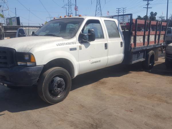2000 ford f550 power stroke TURBODIESEL..7.3 4 doors flat/ STAKE bed... for sale in North Hollywood, CA