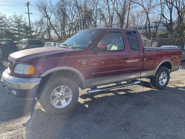 2002 Ford F150 Super Cab Long Bed 4D EZ-FINANCING! - cars & trucks -... for sale in Garfield, NY – photo 2