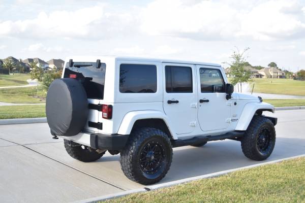 Gorgeous Lifted 2012 Jeep Wrangler Unlimited Sahara for sale in Missouri City, TX – photo 6