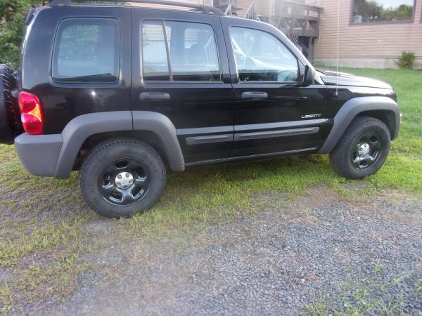 2004 Jeep Liberty (4x4) VERY NICE only (182k) miles - cars & trucks... for sale in fall creek, WI – photo 2