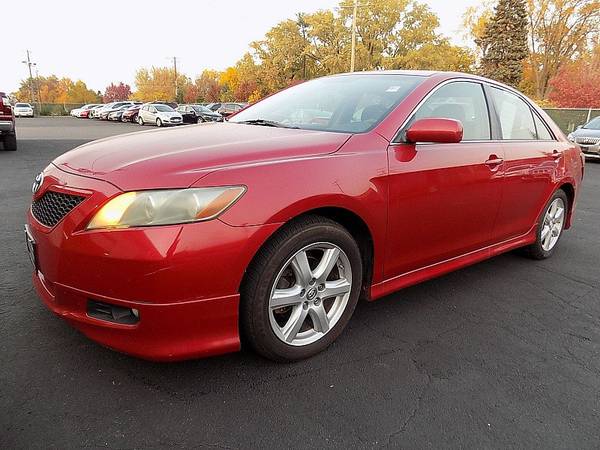 2007 *Toyota* *Camry* *4d Sedan LE Auto* RED - cars & trucks - by... for sale in Crystal, MN – photo 2