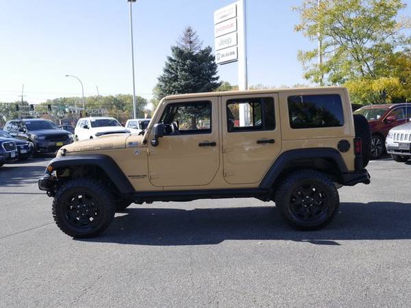 2013 Jeep Wrangler Unlimited Sahara for sale in Brooklyn Park, MN – photo 7