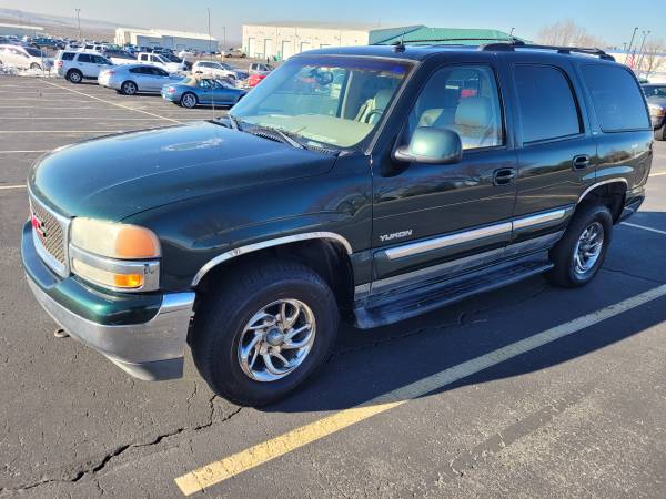 GMC yukon 4x4, below book! brand new tires, great shape inside and for sale in Boise, ID