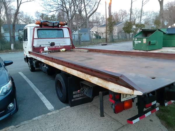 1995 UD 1800 Rollback Flatbed Tow truck for sale in Montville, NJ – photo 4