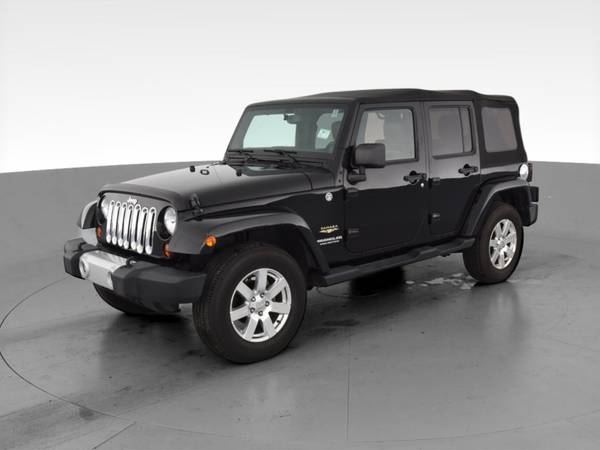 2013 Jeep Wrangler Unlimited Sahara Sport Utility 4D suv Black - -... for sale in Bakersfield, CA – photo 3