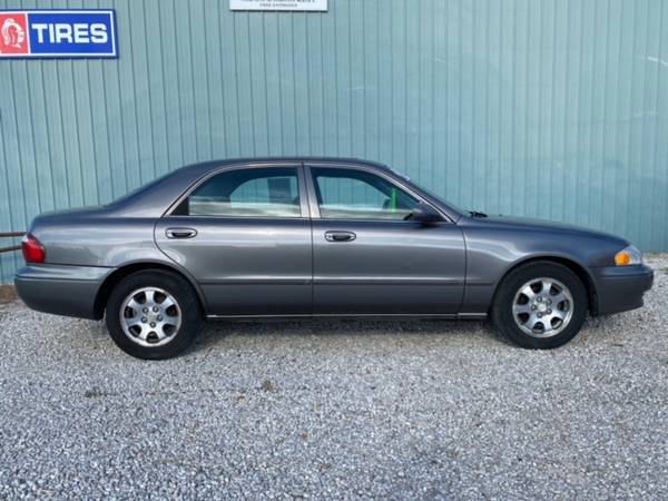 2002 Mazda 626 I4 - cars & trucks - by dealer - vehicle automotive... for sale in Drexel, MO – photo 7