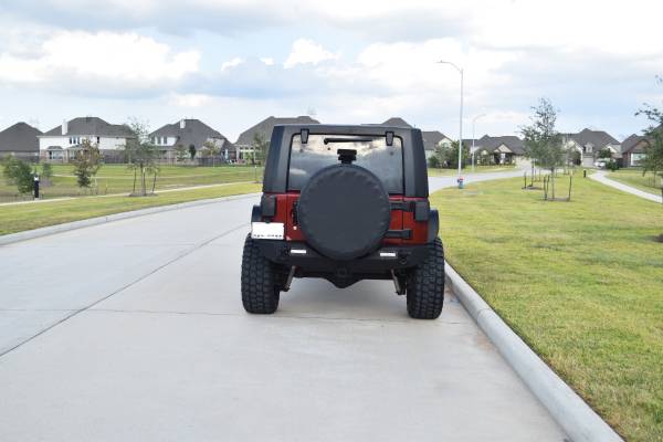 Lifted 2009 Jeep Wrangler Unlimited for sale in Rosharon, TX – photo 7