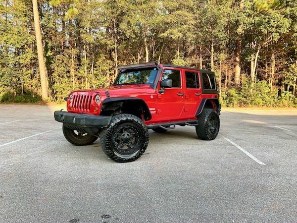 Jeep Wrangler Unlimited Sport - cars & trucks - by owner - vehicle... for sale in Saraland, AL