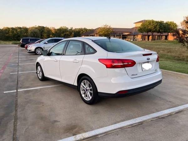 2015 white Ford Focus SE 4 door 1.8 liter automatic - cars & trucks... for sale in Arlington, TX – photo 2