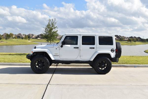 Gorgeous Lifted 2012 Jeep Wrangler Unlimited Sahara for sale in Missouri City, TX