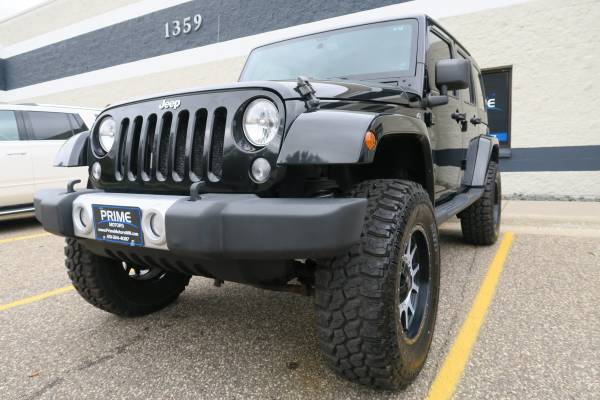 2014 Jeep Wrangler Unlimited Sahara 4WD **Lifted, One Owner, Manual** for sale in Andover, MN – photo 3